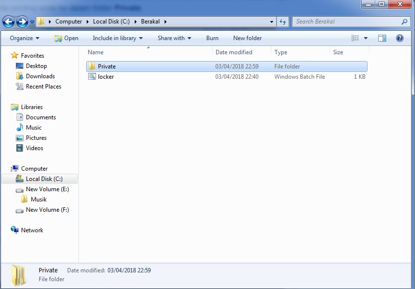 mengunci folder dengan password